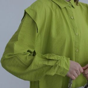 Green women’s shirt